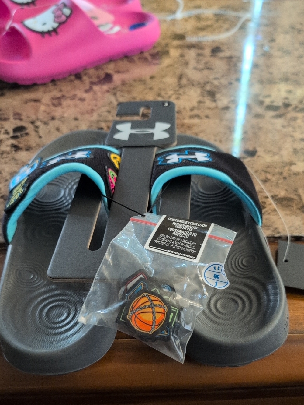 Under Armour Black Slide Sandals with Teal Trim and Charm Pack